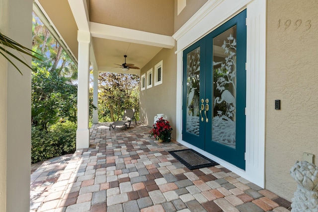 exterior space featuring ceiling fan and french doors