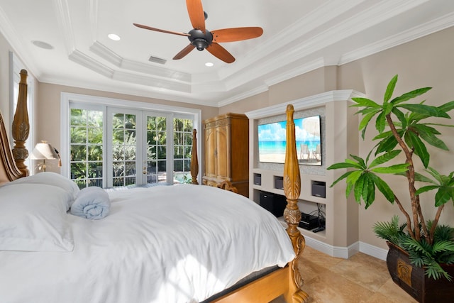 tiled bedroom featuring ceiling fan, french doors, crown molding, a tray ceiling, and access to outside