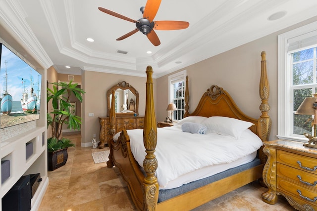 tiled bedroom featuring a raised ceiling, crown molding, and ceiling fan