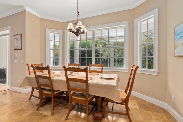 tiled dining space with crown molding and a chandelier