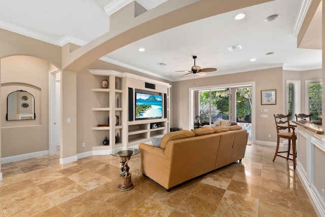 living room featuring plenty of natural light, built in shelves, ceiling fan, and light tile floors