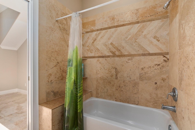 bathroom with shower / tub combo and tile floors