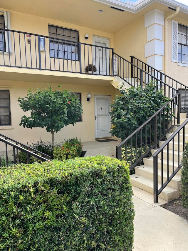 doorway to property with a balcony