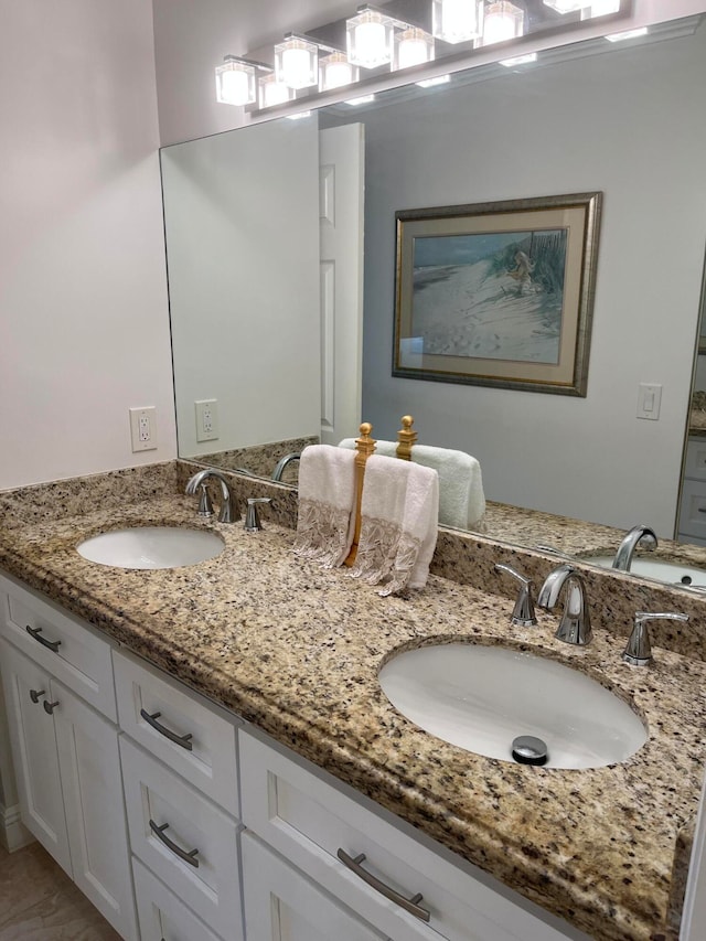 bathroom featuring double vanity