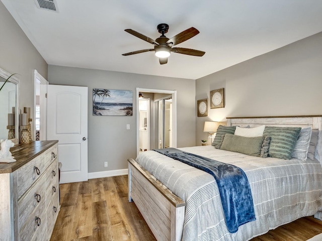 bedroom featuring ceiling fan and wood-type flooring