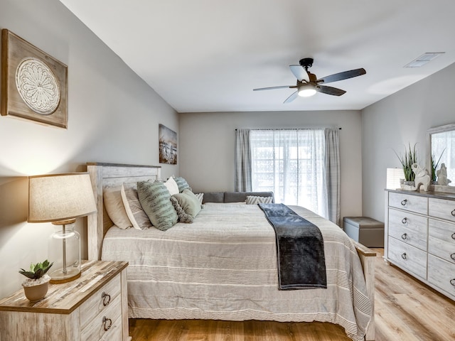 bedroom featuring ceiling fan and light wood-type flooring