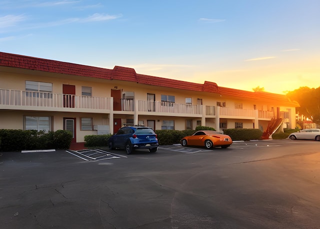 view of outdoor building at dusk