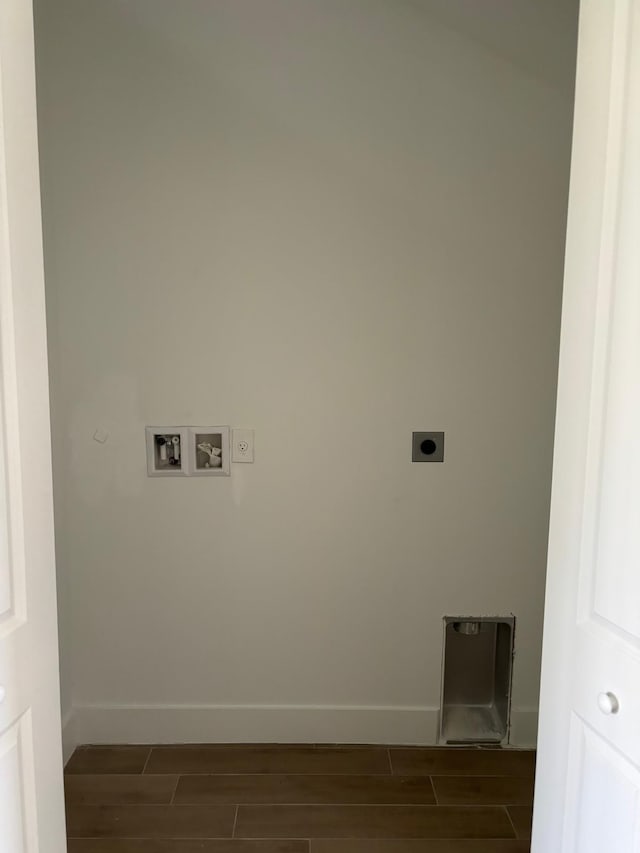 clothes washing area featuring washer hookup, dark hardwood / wood-style floors, and hookup for an electric dryer