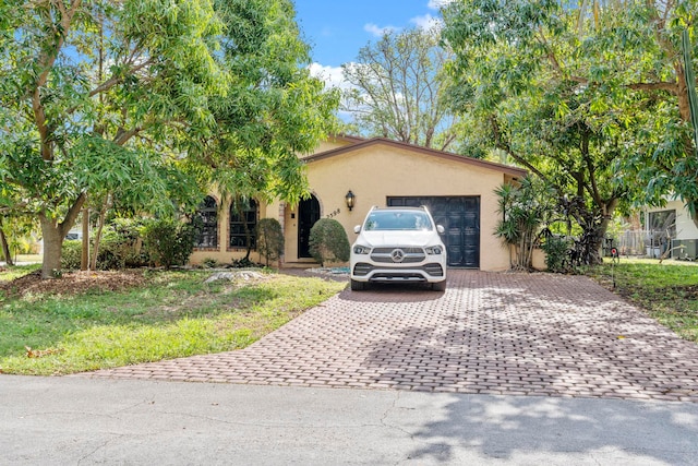 view of front of property featuring a garage