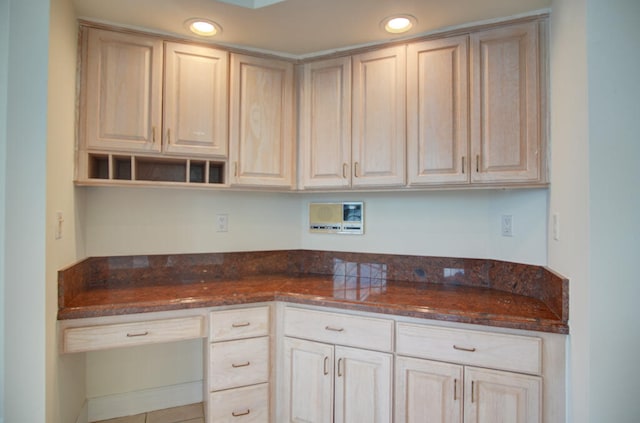 kitchen with dark stone counters