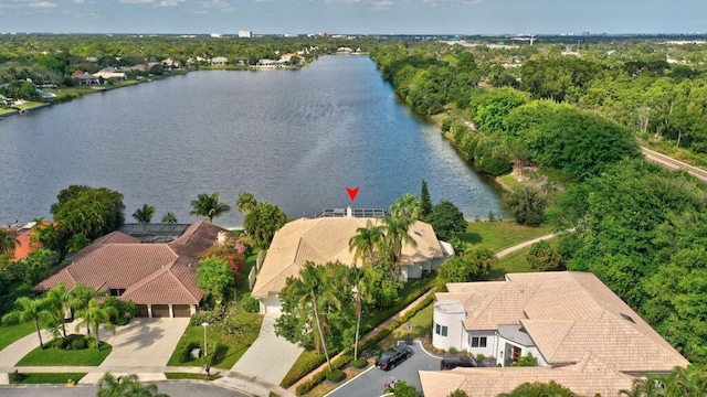 birds eye view of property featuring a water view