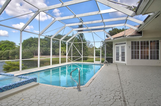 view of pool featuring a patio, french doors, and glass enclosure