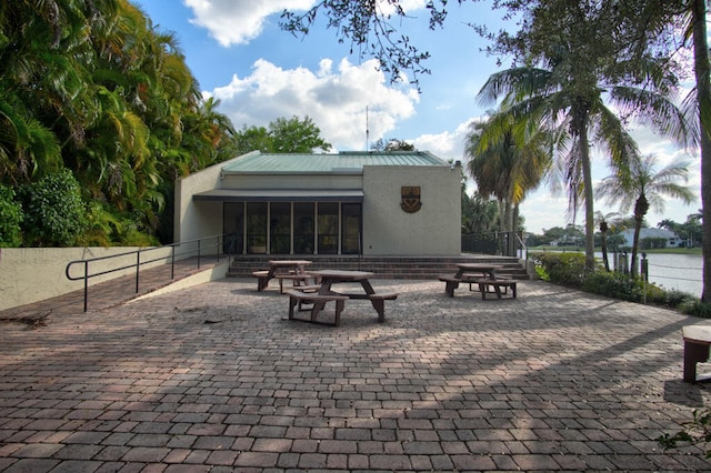 view of patio / terrace with a water view