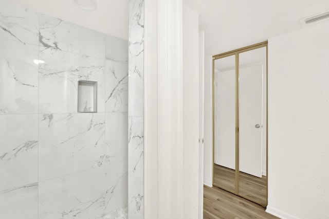 bathroom featuring wood-type flooring