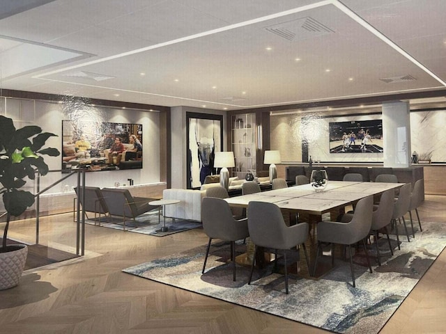 dining room featuring dark parquet flooring