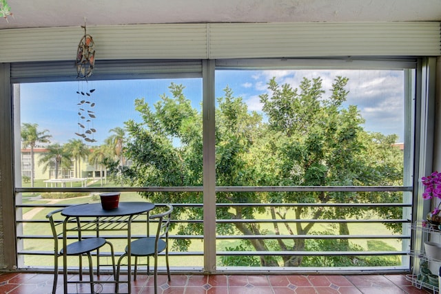 sunroom / solarium featuring a wealth of natural light