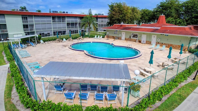 view of swimming pool with a patio and a gazebo