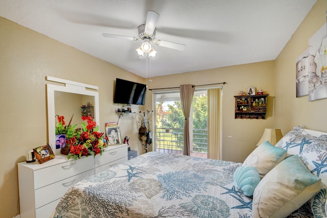 bedroom featuring access to outside and ceiling fan