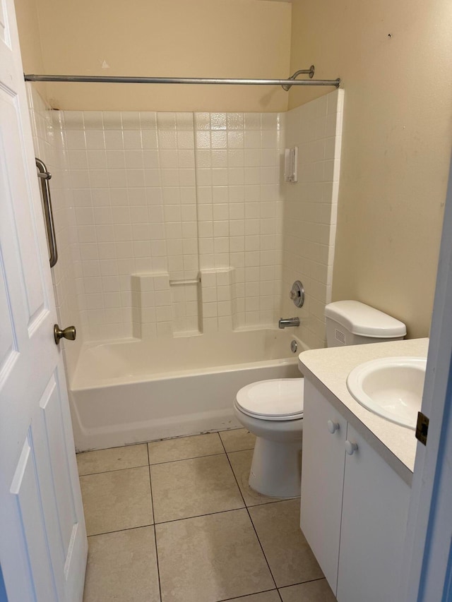 full bathroom with  shower combination, toilet, tile floors, and vanity