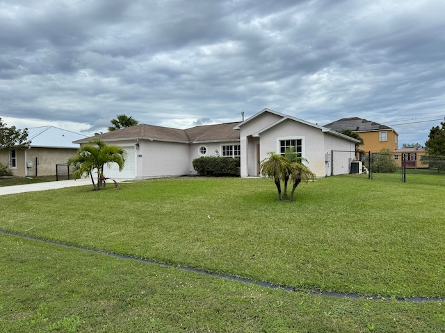 single story home featuring a front yard