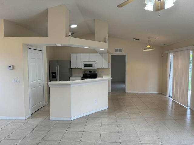 kitchen featuring ceiling fan, white cabinets, appliances with stainless steel finishes, and light tile floors