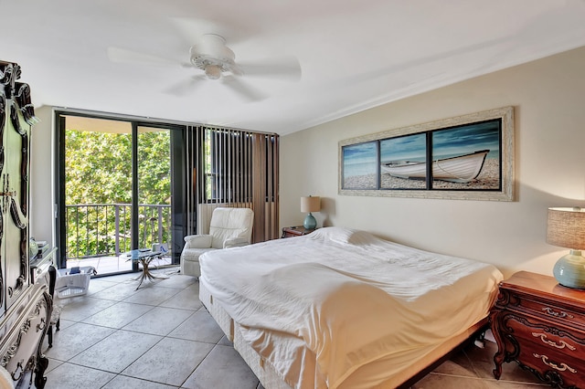 bedroom featuring a wall of windows, light tile patterned floors, ceiling fan, and access to exterior