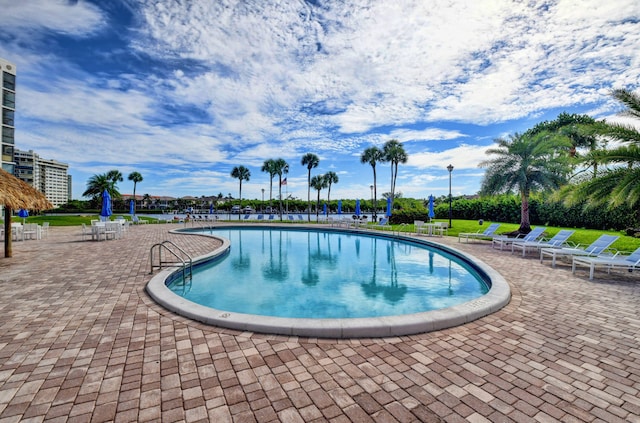 view of swimming pool featuring a patio