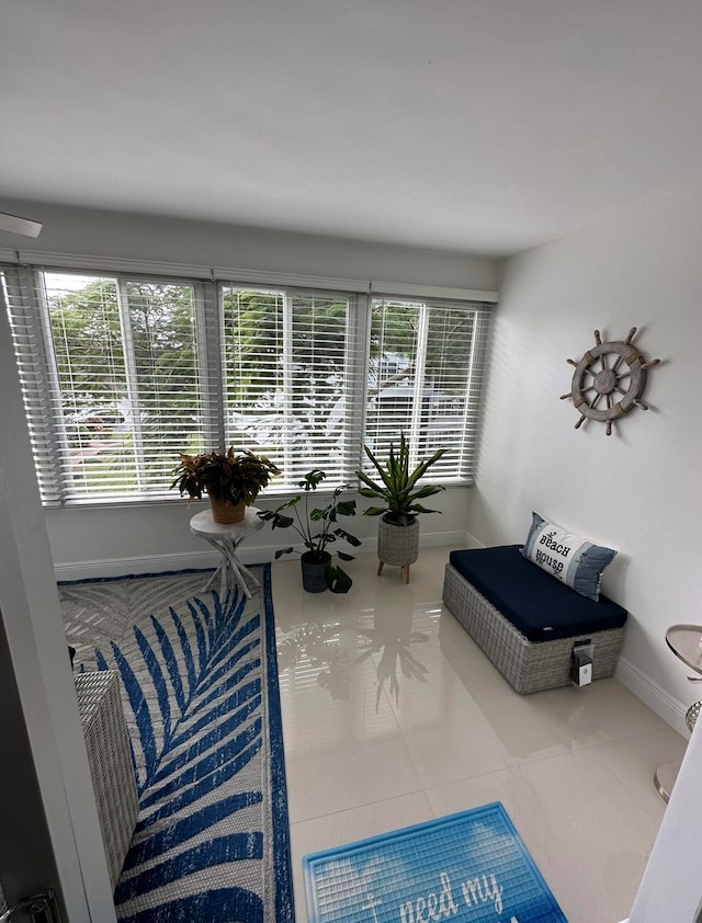 living room featuring light tile flooring