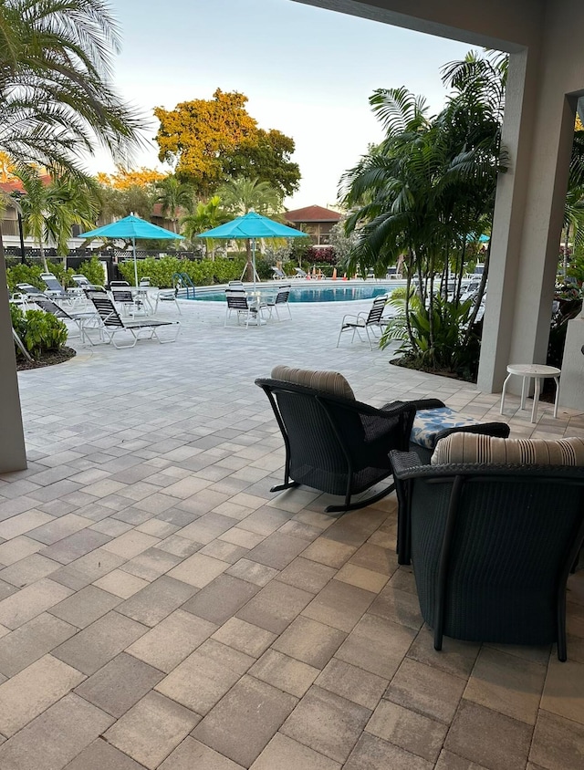 view of patio with a community pool