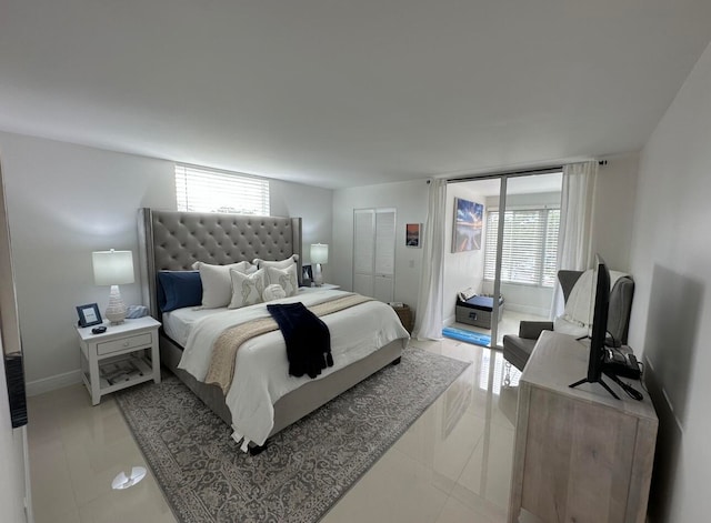 bedroom featuring light tile flooring