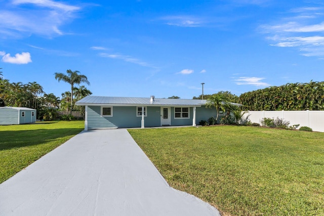 single story home with a front lawn