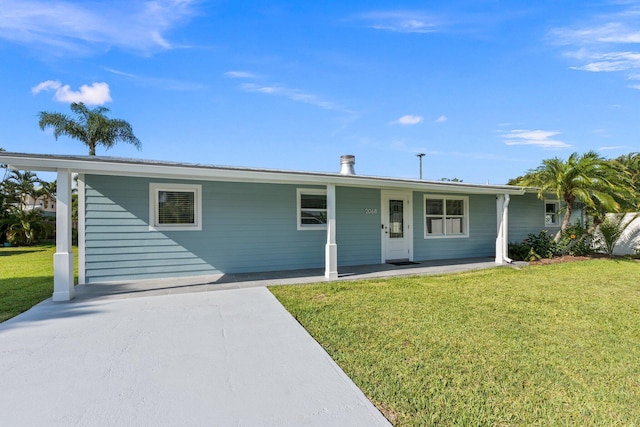 ranch-style house with a front lawn