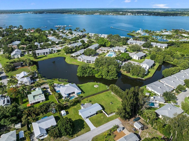 bird's eye view with a water view