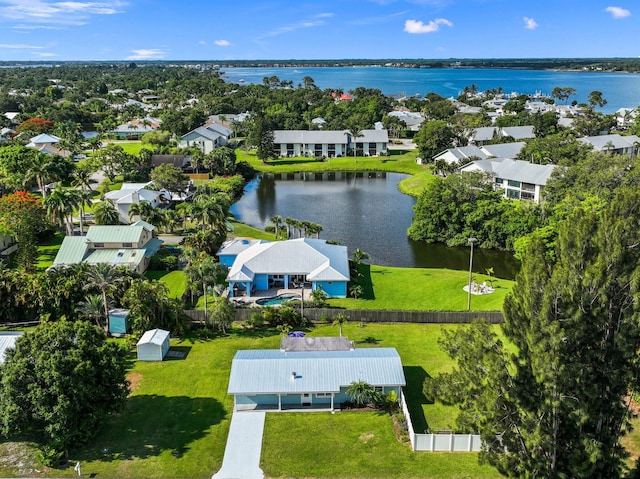 bird's eye view with a water view