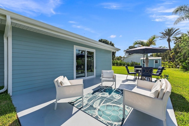 view of patio featuring a storage unit