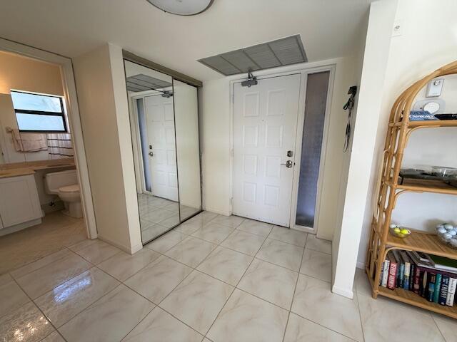 interior space featuring light tile patterned flooring