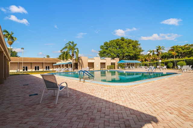 view of swimming pool featuring a patio