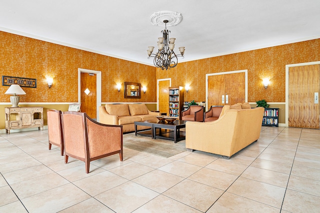 tiled living room featuring ornamental molding and a chandelier