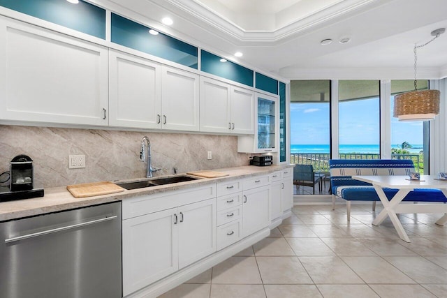 kitchen featuring white cabinetry, sink, and dishwasher