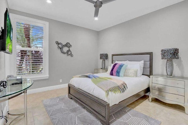 bedroom featuring light tile patterned floors and ceiling fan