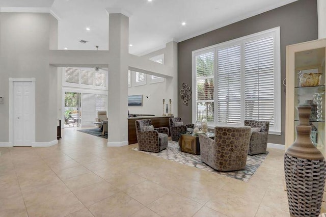 tiled living room featuring a high ceiling