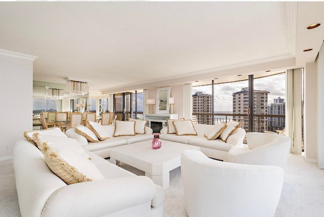 carpeted living room with expansive windows and crown molding