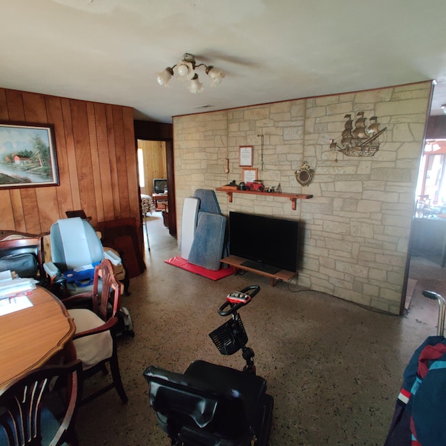 living room featuring wooden walls