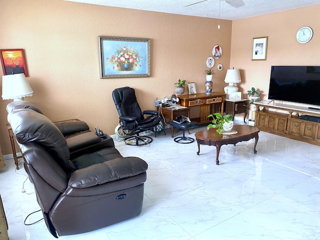 living room with light tile flooring, ceiling fan, and a textured ceiling