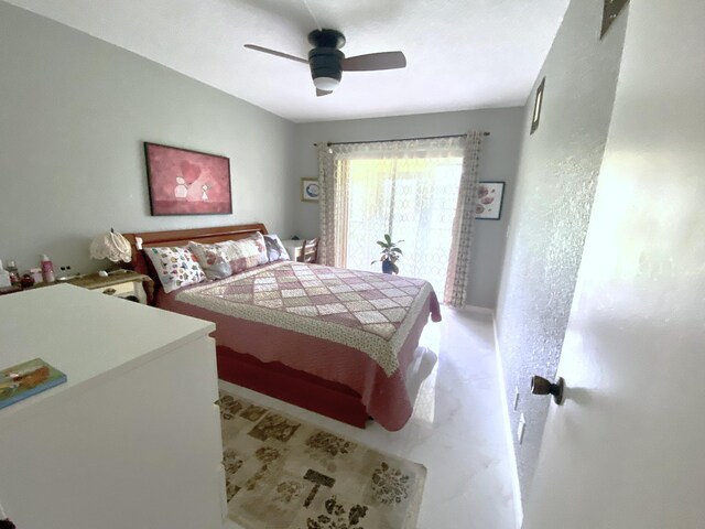 bedroom featuring ceiling fan