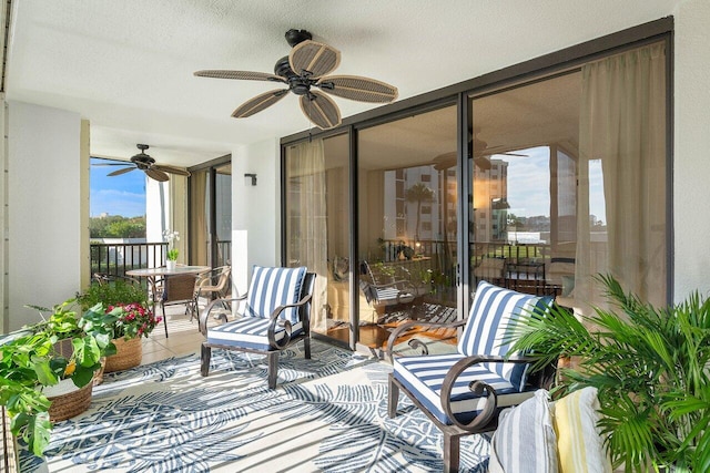 exterior space featuring ceiling fan