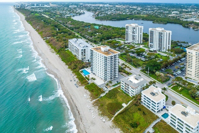 aerial view with a beach view and a water view