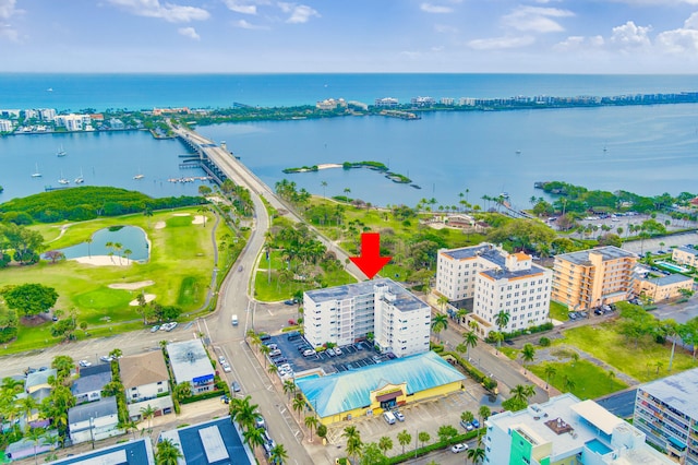 birds eye view of property featuring a water view