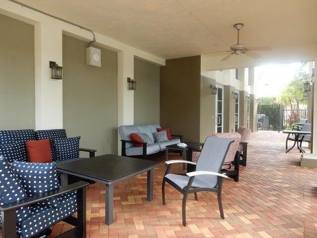 view of patio / terrace with outdoor lounge area and ceiling fan