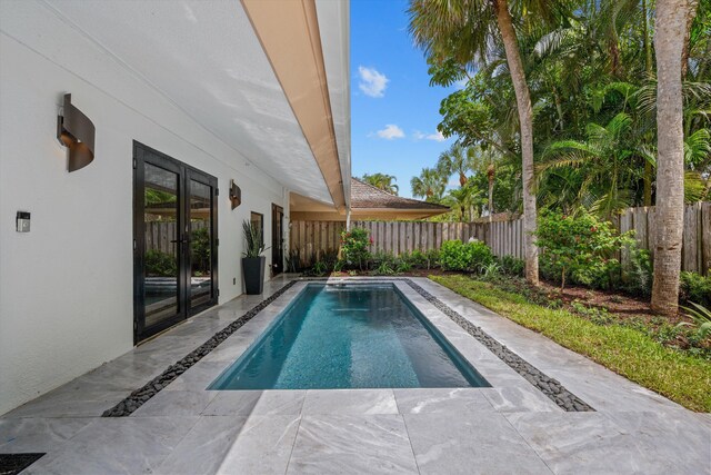 view of pool featuring a patio